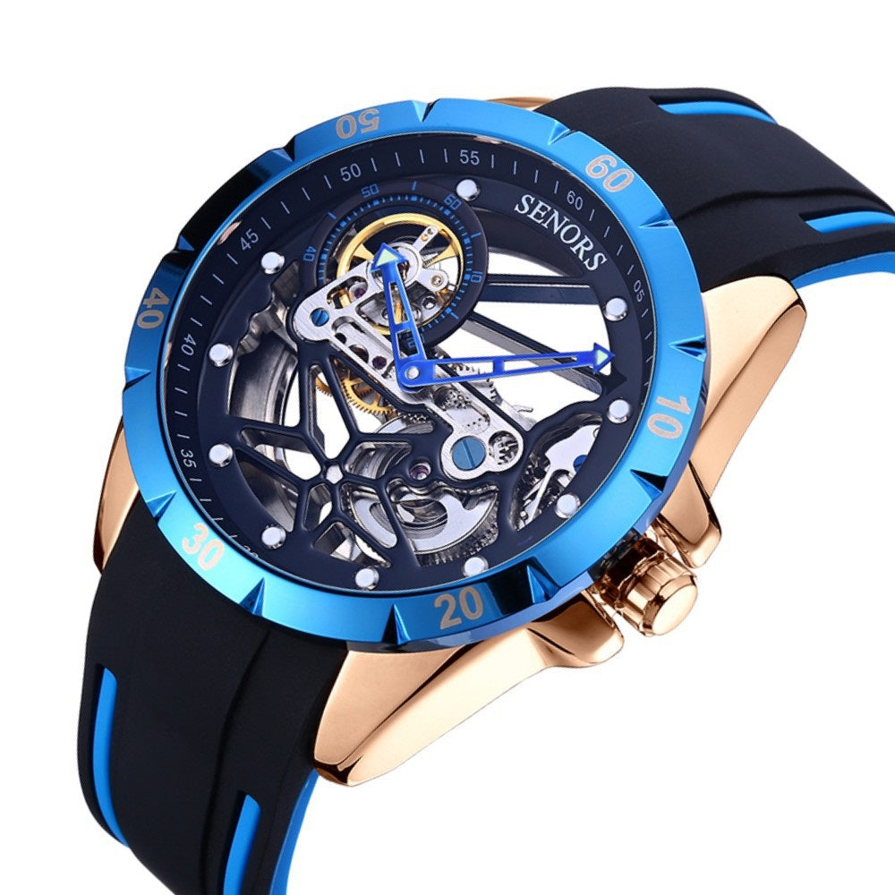 Rose-gold skeleton men's watch with blue bezel; black rubber strap, skeleton dial and hands