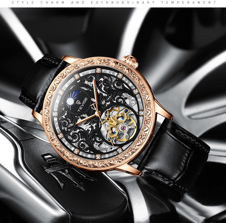Rose-gold mechanical skeleton watch with black leather strap and ornate openwork dial