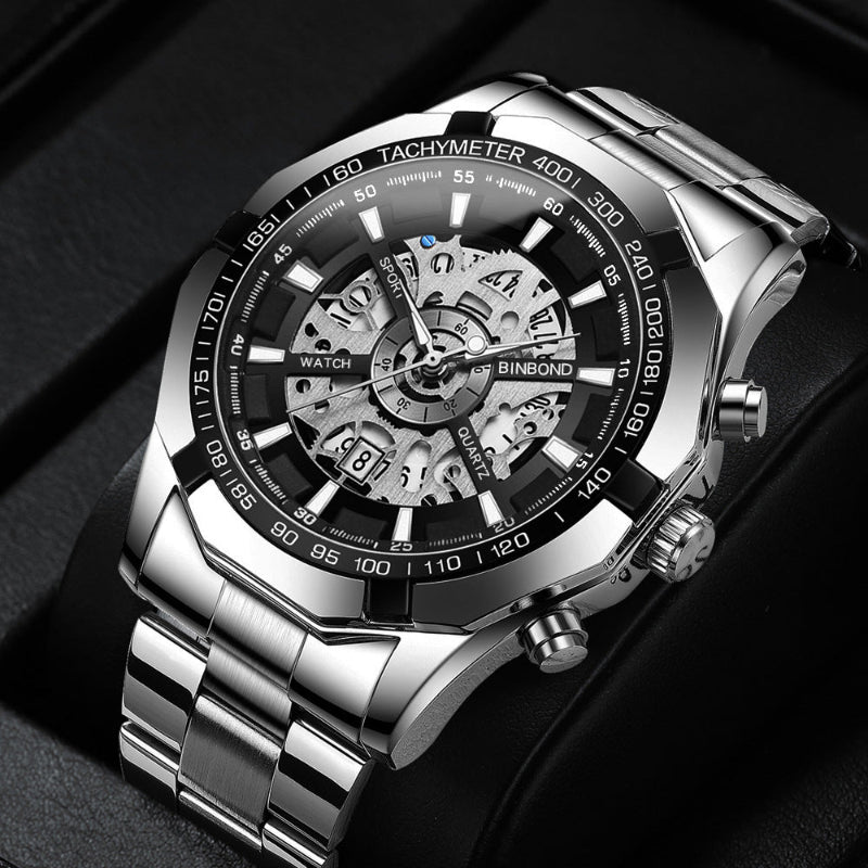 Men's skeleton quartz watch with silver-tone case, black bezel, and silver dial.