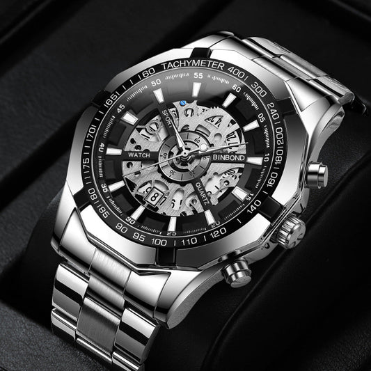 Men's skeleton quartz watch with silver-tone case, black bezel, and silver dial.