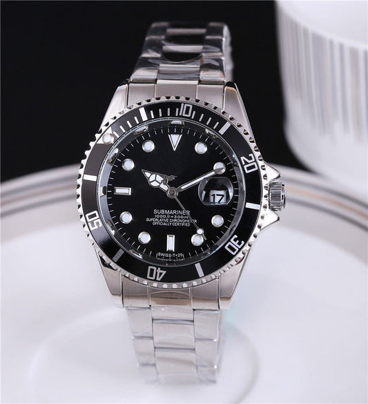 Steel wristwatch with black dial, stainless bracelet, black bezel with minute markers.