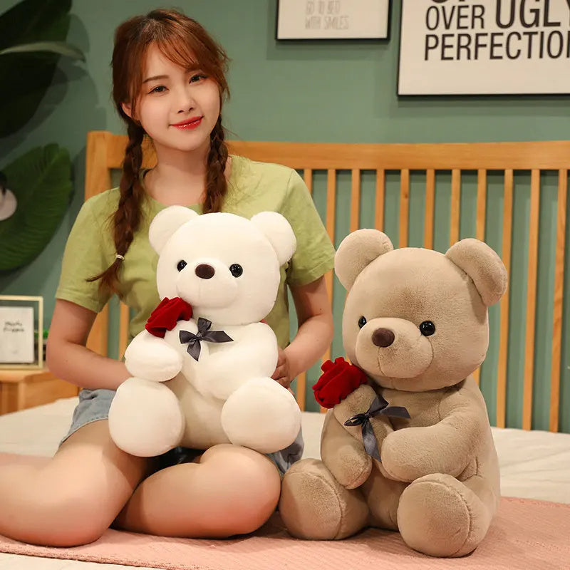 Woman holding two teddy bears, one white and one brown. YAXSO UAE ONLINE STORE
