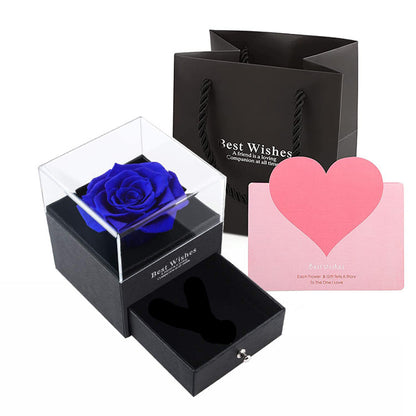 Acrylic jewelry gift box with blue preserved rose in a clear display cover