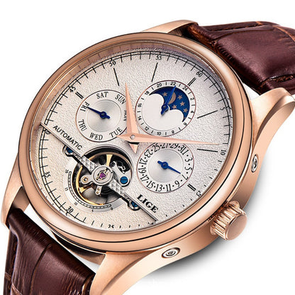 Luxury watch with brown leather strap and detailed face on white background
