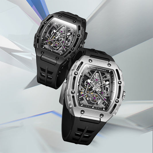 Two black and silver watches on a light gray background