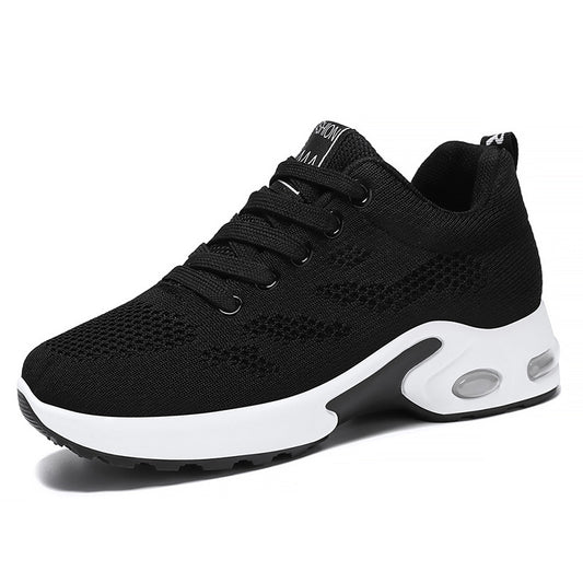 Black sneaker with white sole on a white background
