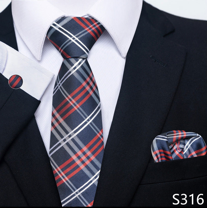 Navy, red, and white plaid tie set with matching pocket square and round cuff links.