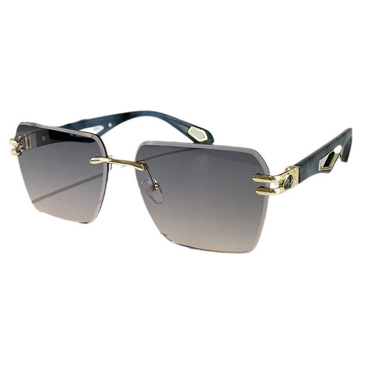 Sunglasses with gold and black frame on a white background