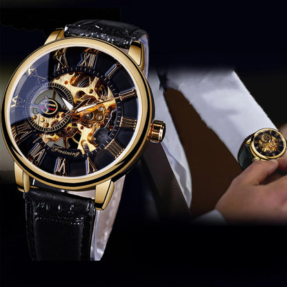 Luxury watch with black leather strap and gold detailing on a dark background