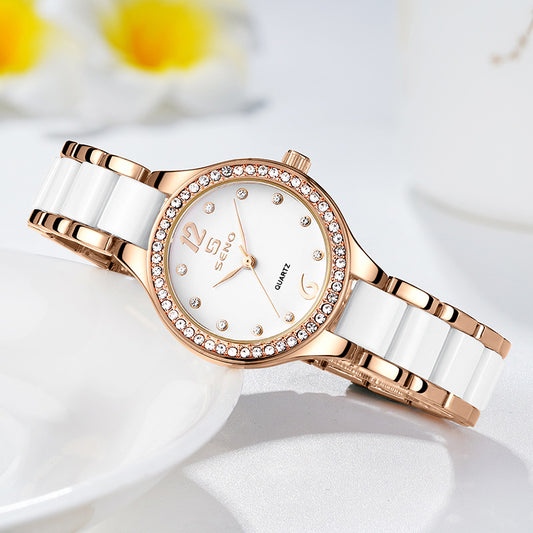 Rose gold and white watch with floral background