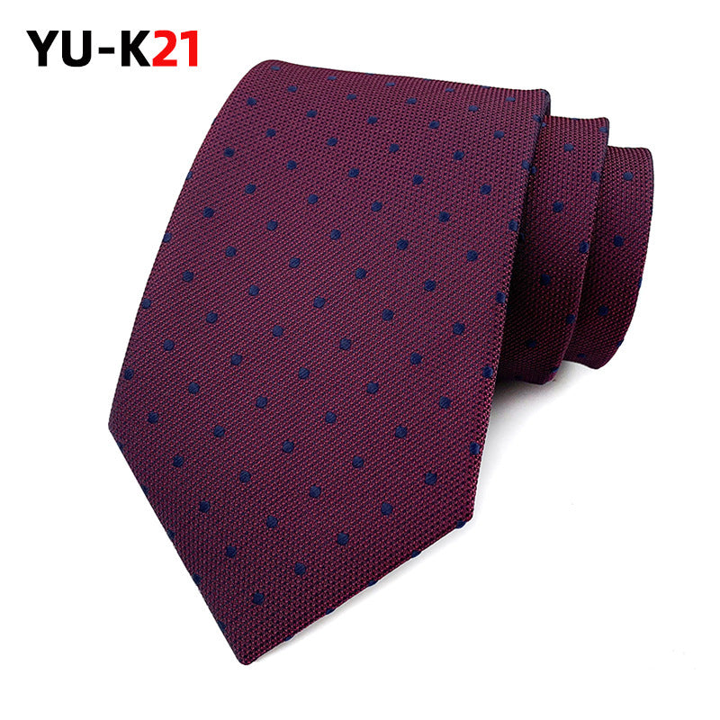 Maroon tie with blue polka dots on a white background, branded 'YU-K21'.