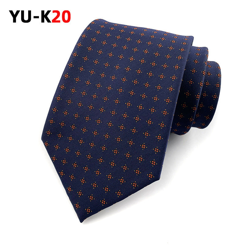 Navy blue tie with orange pattern on a white background, featuring the brand 'YU-K20'.