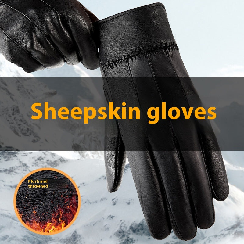 Close-up of black leather glove fingers with stitched cuff edge and textured palm grain.
