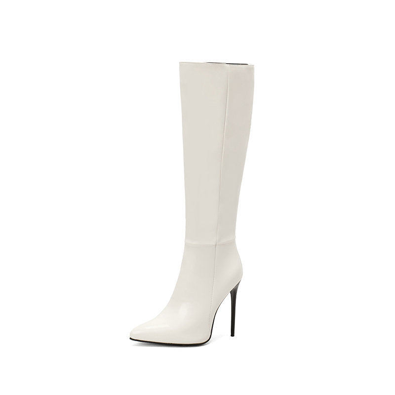 White pointed-toe stiletto boots with side zipper, below-knee height
