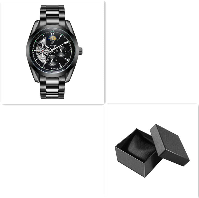 Black open-heart mechanical watch shown alongside an open black box