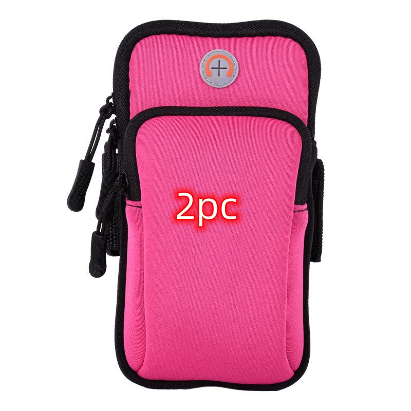 Pink running phone pouch with black trim, zipper closure, and side attachment