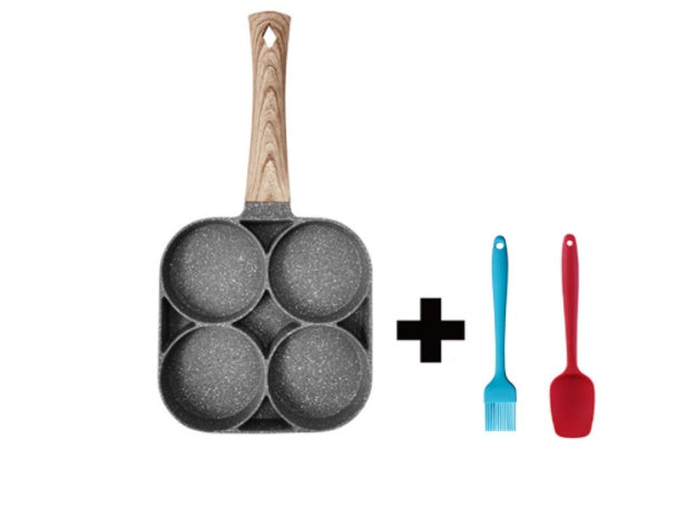 Multicolored frying pan with four compartments and two silicone brushes on a white background