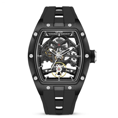 Black mechanical watch with transparent face on a white background