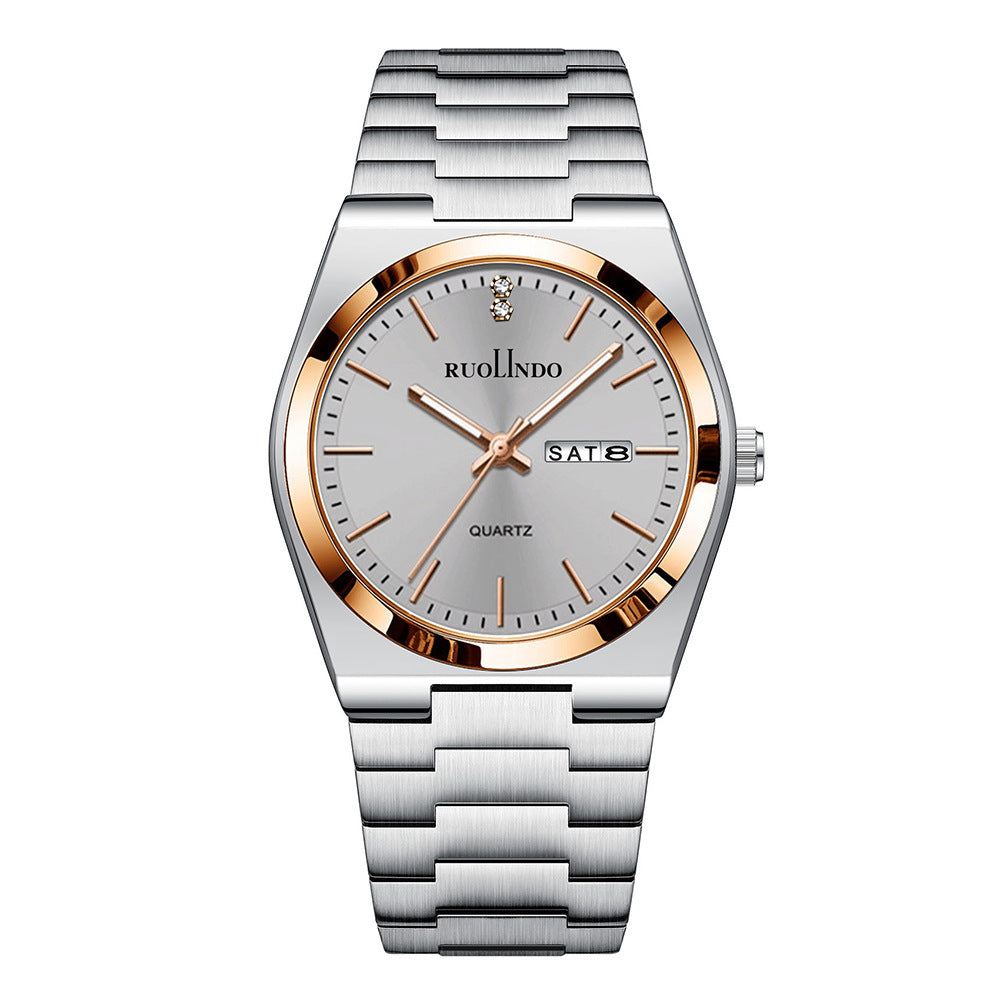 Day-date quartz watch with white dial, gold-tone bezel, silver metal bracelet, date window