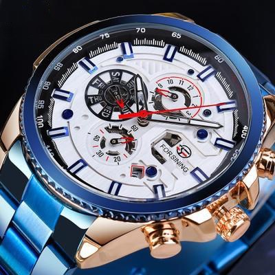 Luxury watch with detailed face and blue and gold casing on a dark background
