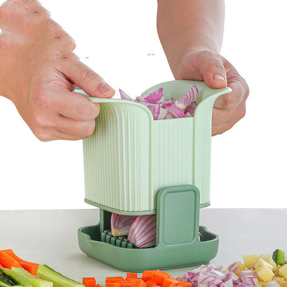 Person using a green vegetable chopper to slice onions on a white background