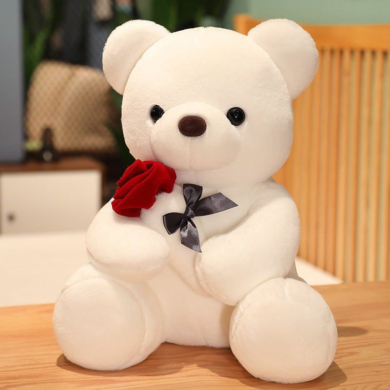 White teddy bear with a red rose and black bow tie YAXSO UAE ONLINE STORE