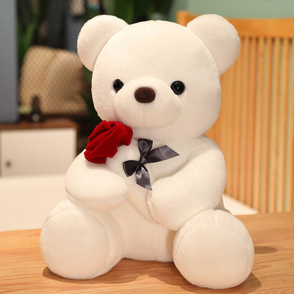 White teddy bear with a red rose and black bow tie YAXSO UAE ONLINE STORE