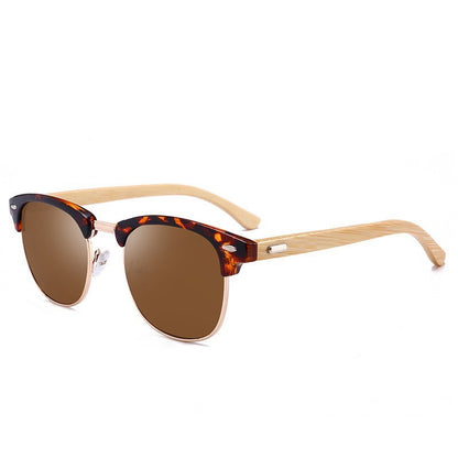 Sunglasses with tortoiseshell frame and brown lenses on a white background