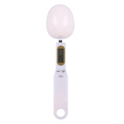 Digital kitchen scale with a white platform on a white background