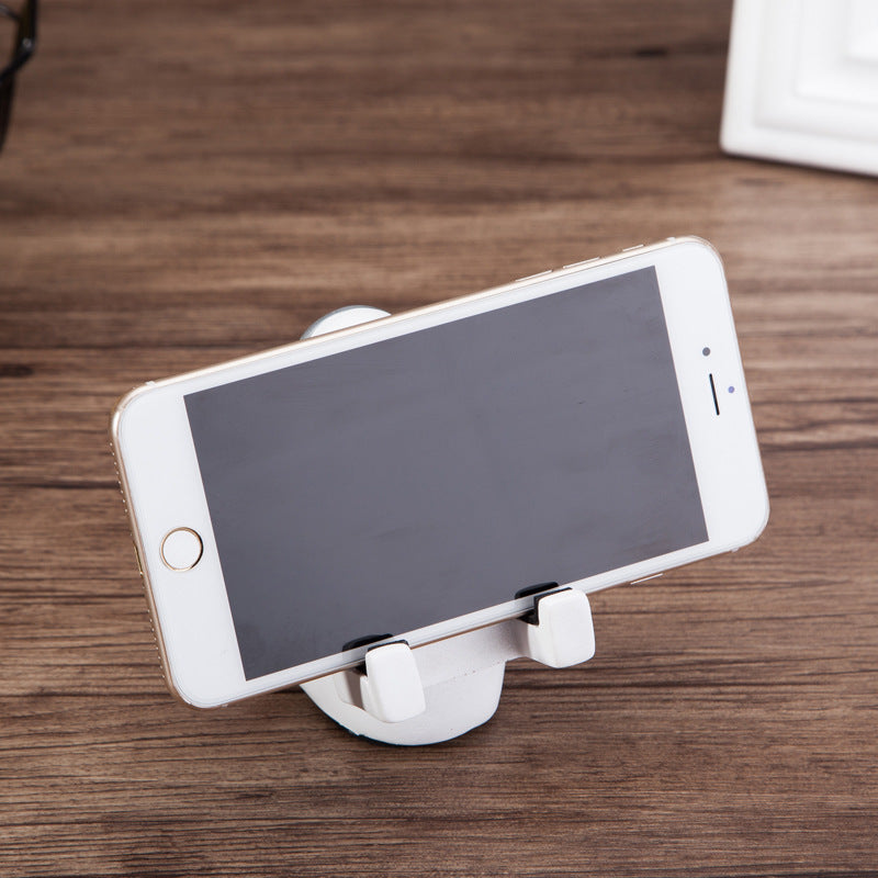 White phone cradle stand with two side supports for mobile phones