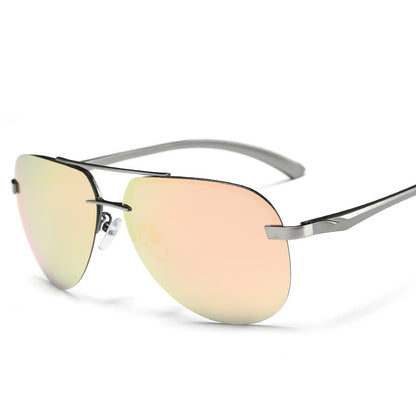 Sunglasses with gold-tinted lenses and silver frame on a white background