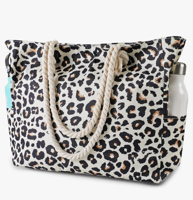 Printed polyester shoulder bag with leopard print, braided rope handles, open top