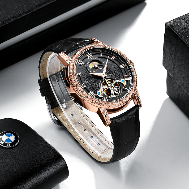 Men's automatic watch with black leather strap and rose gold-tone case, angled view