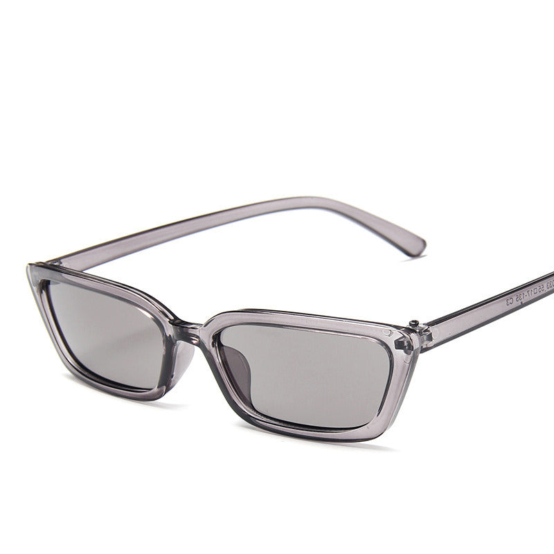 Clear grey rectangle resin sunglasses with dark-tinted lenses