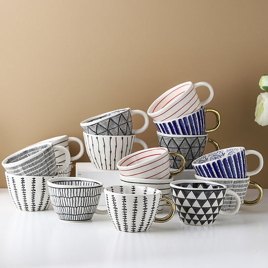 Set of patterned cups on a beige background