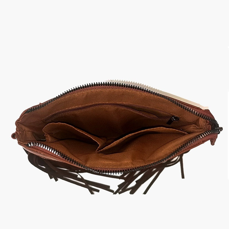 Brown crossbody bag open view with zip closure and fabric lining; tassel trim at sides