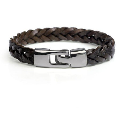Braided leather bracelet with a silver clasp on a white background