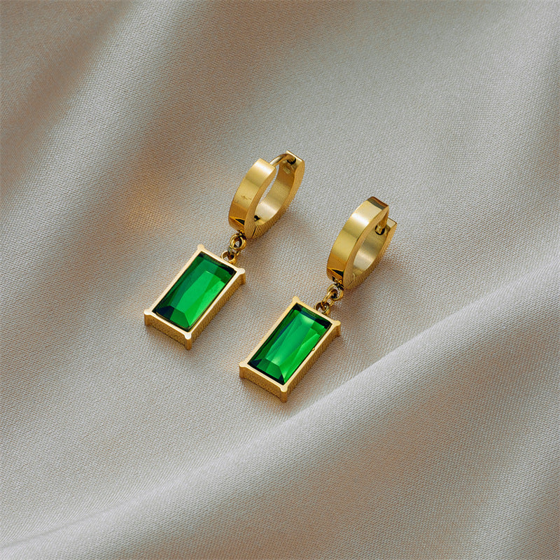 Gold-tone hoop earrings with green square zircon pendant fronts and dangling squares