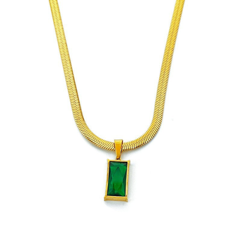 Gold-tone snake chain necklace with green square zircon pendant, centered view