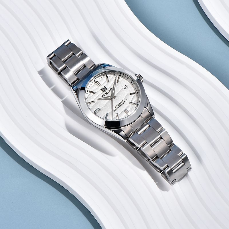 Men's automatic watch with white dial and silver metal bracelet on strap