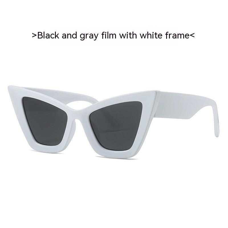 White cat-eye sunglasses with dark gray tinted lenses and slim angular frame