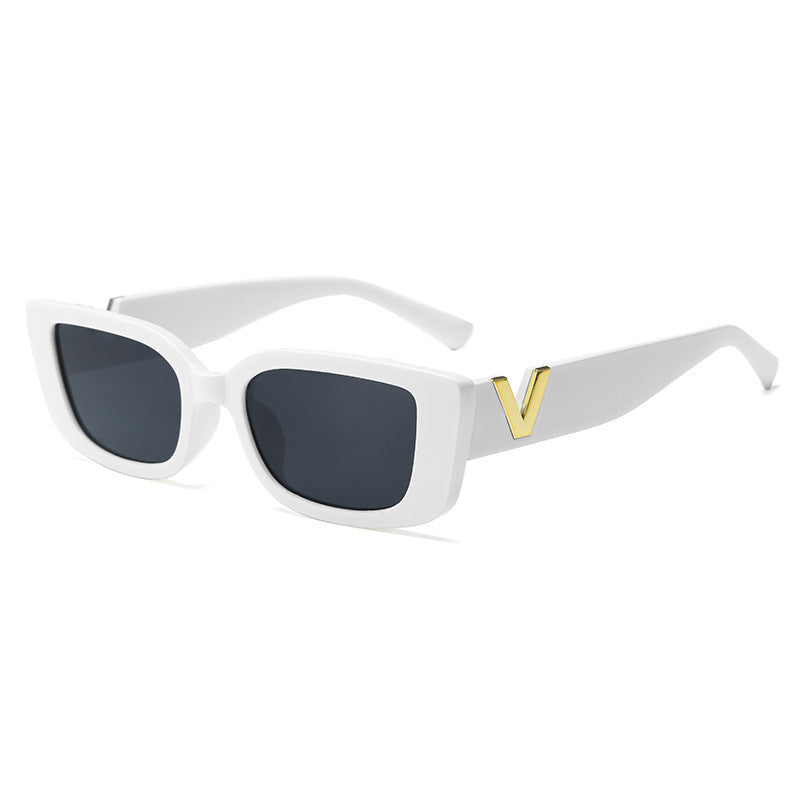 Square white frame sunglasses with dark lenses and gold V temple detail