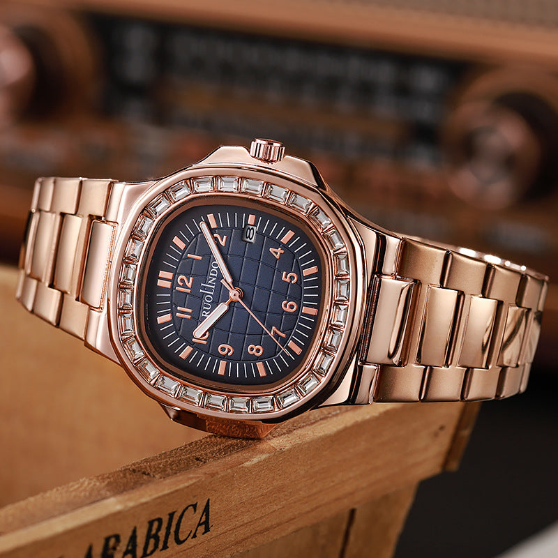 Men's rose-gold tone quartz wrist watch with dark dial and rose-gold link bracelet