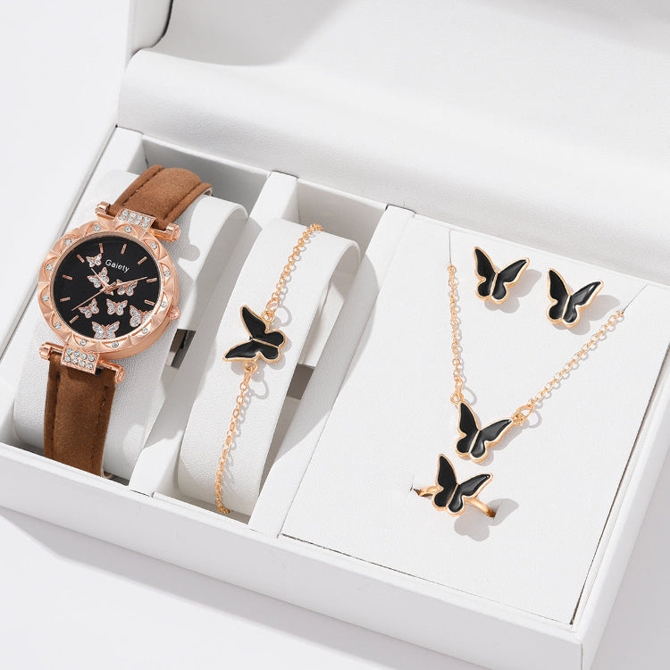 Women’s butterfly quartz watch with dark brown strap and butterfly jewelry set in box