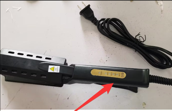 Hair steam straightener with side control bar and attached black power cord