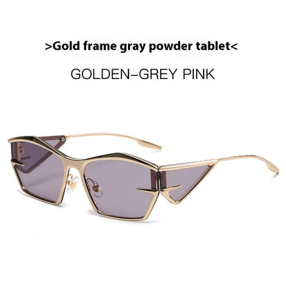 Gold-framed sunglasses with purple-pink tinted lenses and angular full rims