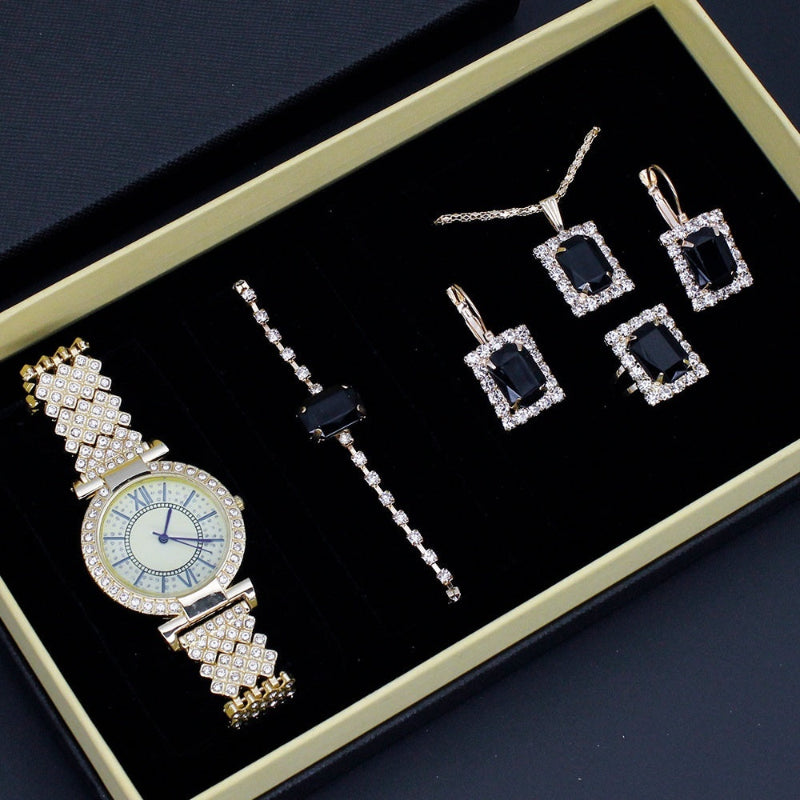 Gold-tone women's watch and jewelry set with bracelet and four dangling square earrings