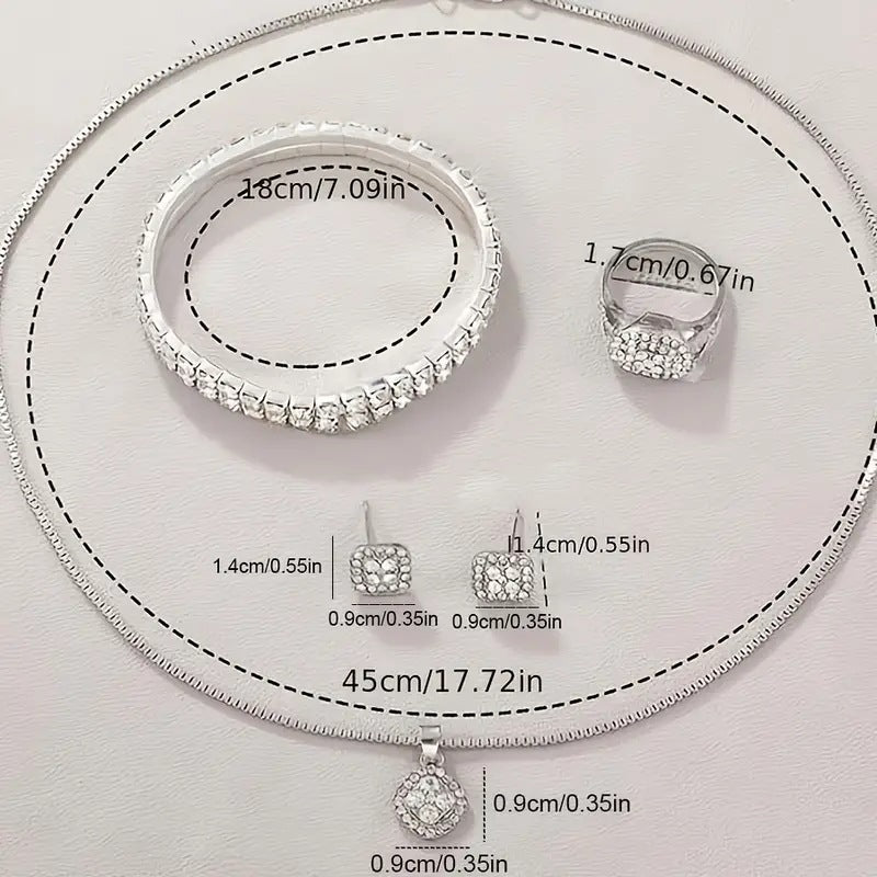Women’s silver crystal jewelry set with rhinestone necklace, bracelet, ring, and stud earrings