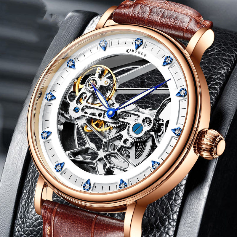 Rose-gold skeleton automatic watch with brown leather strap and blue accents on dial