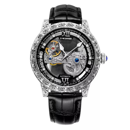 Luxury watch with intricate design and black leather strap on white background